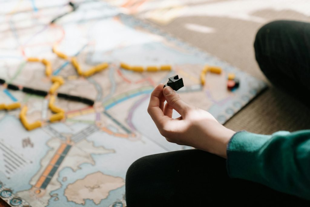 A kid playing risk, image for game balance fundamentals 
